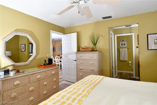 bedroom with ceiling fan and light hardwood / wood-style flooring