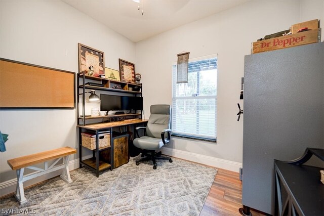 office area featuring light hardwood / wood-style floors