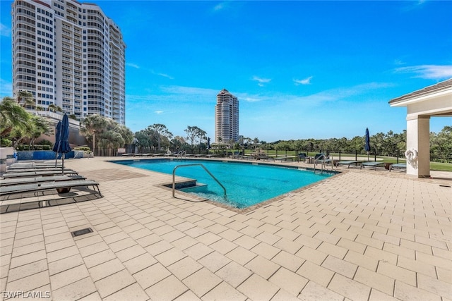 pool featuring a patio area