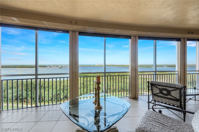 sunroom with a water view