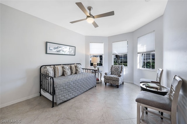 interior space featuring ceiling fan