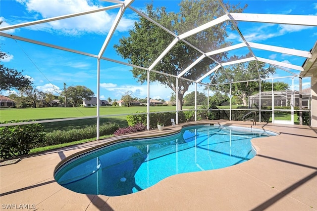 view of pool with a lanai and a patio