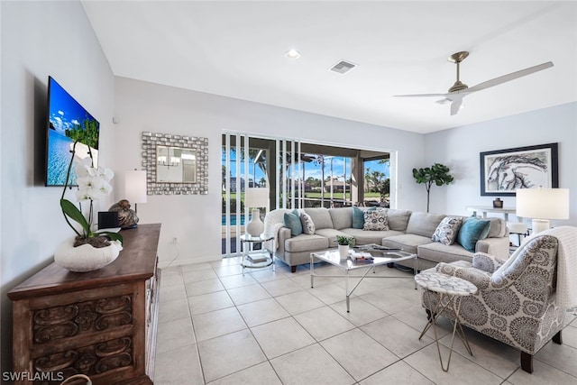 tiled living room featuring ceiling fan