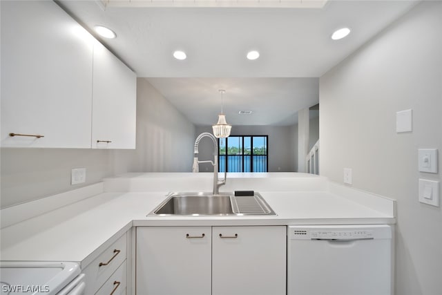 kitchen with white cabinetry and white dishwasher