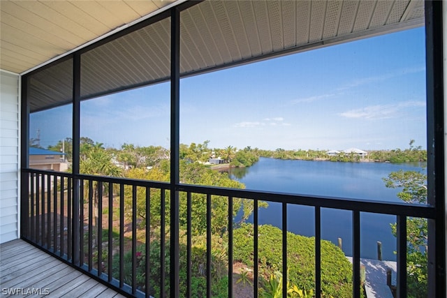 exterior space with a water view