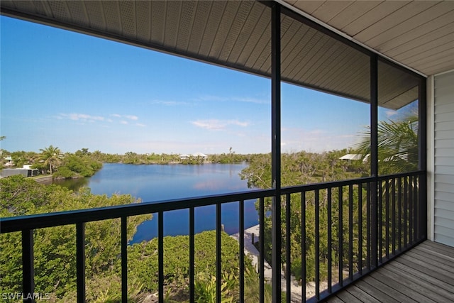 balcony featuring a water view