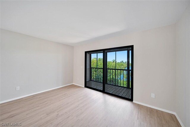 empty room featuring light hardwood / wood-style floors