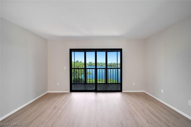 empty room featuring light hardwood / wood-style floors