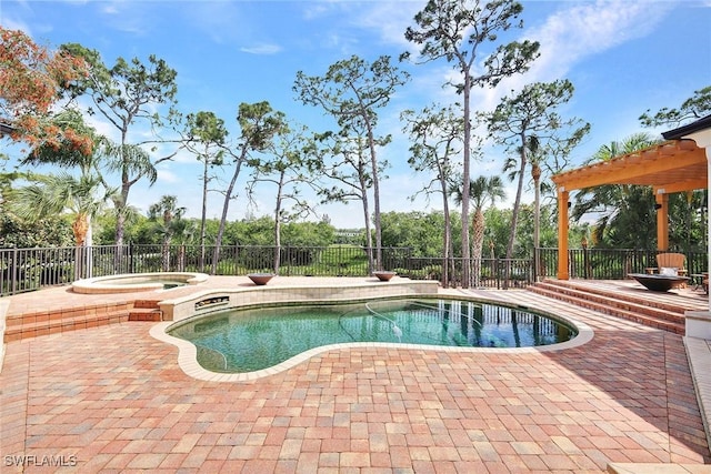 27820 Riverwalk Way, Bonita Springs, FL 34134 - view of swimming pool with an in-ground hot tub, a patio area, and fence