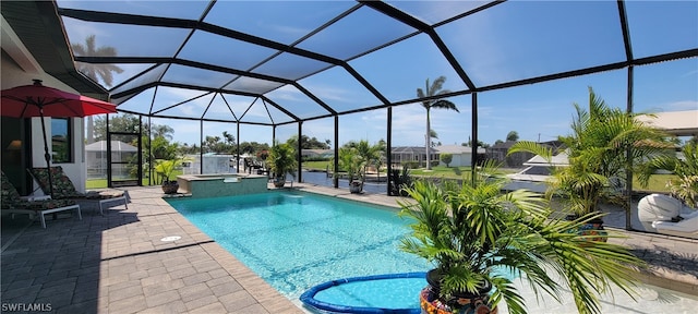 view of pool featuring a lanai and a patio area