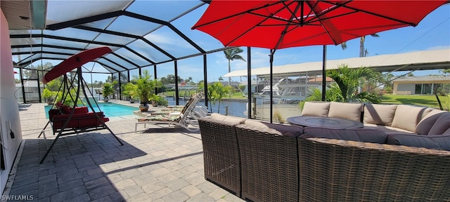 unfurnished sunroom featuring a water view