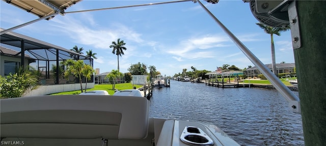 property view of water with a dock