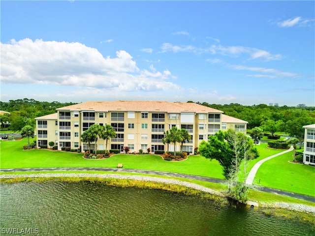 view of building exterior with a water view