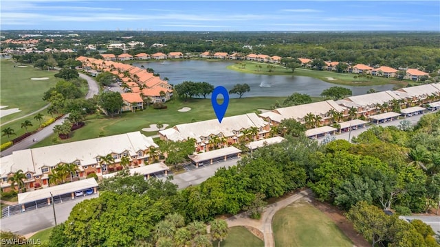 aerial view featuring a residential view, view of golf course, and a water view