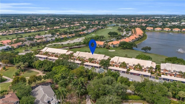 birds eye view of property with a water view and a residential view