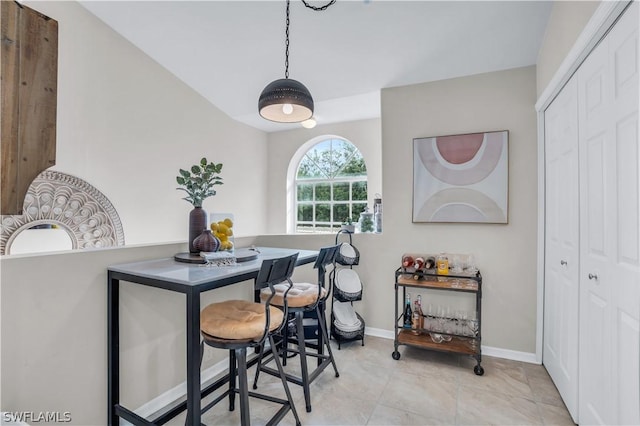 dining space with baseboards