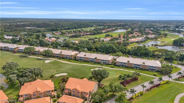 bird's eye view with a residential view, view of golf course, and a water view