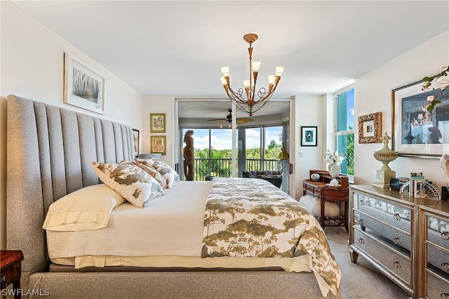 bedroom featuring access to outside, carpet flooring, and an inviting chandelier