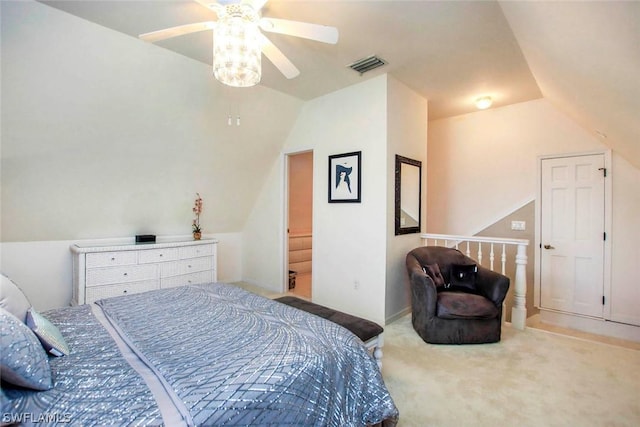 carpeted bedroom featuring visible vents, a ceiling fan, and vaulted ceiling