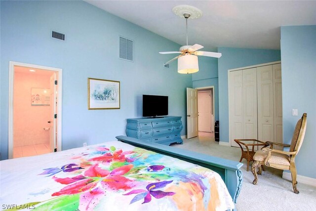 bedroom featuring visible vents, carpet floors, high vaulted ceiling, and a closet