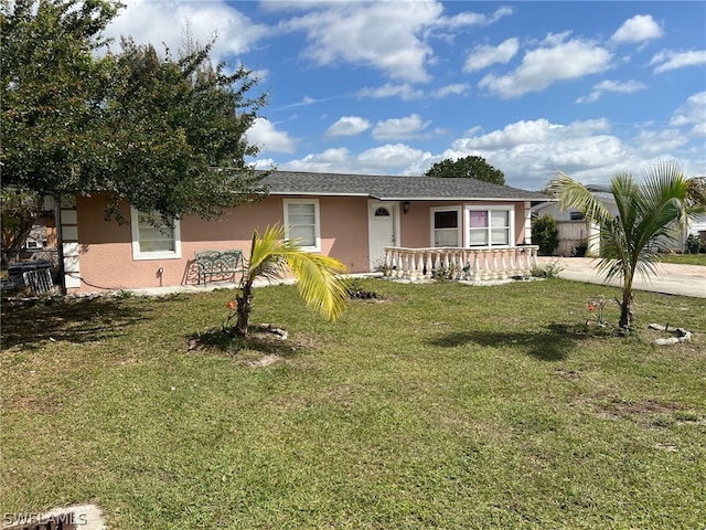 ranch-style house with a front yard