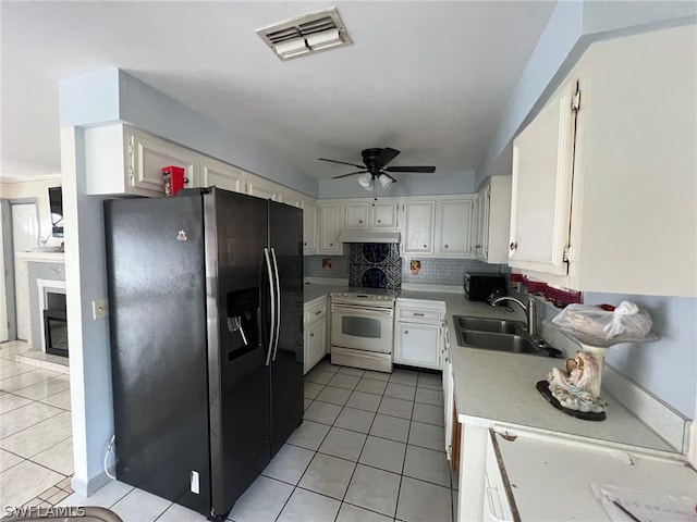 kitchen with electric stove, black refrigerator with ice dispenser, tasteful backsplash, white cabinetry, and sink