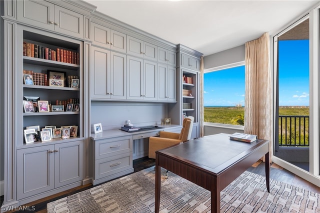 office space with light hardwood / wood-style flooring