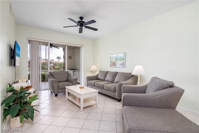 tiled living room featuring ceiling fan