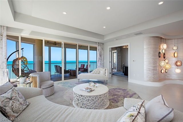 living room featuring a water view