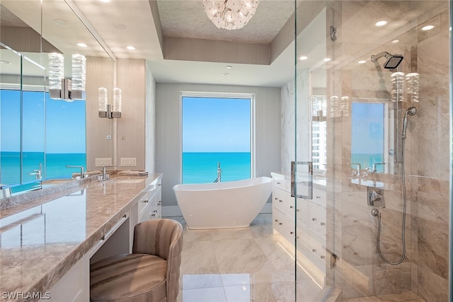 bathroom featuring shower with separate bathtub, tile flooring, a water view, a textured ceiling, and vanity