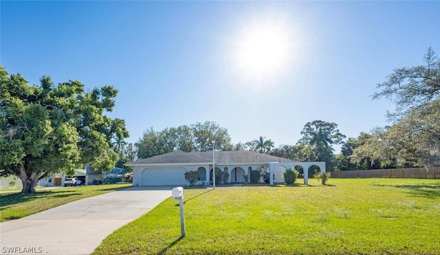 ranch-style house with a front lawn and a garage