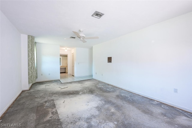 spare room with ceiling fan