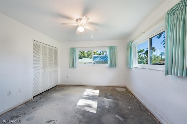 unfurnished bedroom featuring a closet and ceiling fan