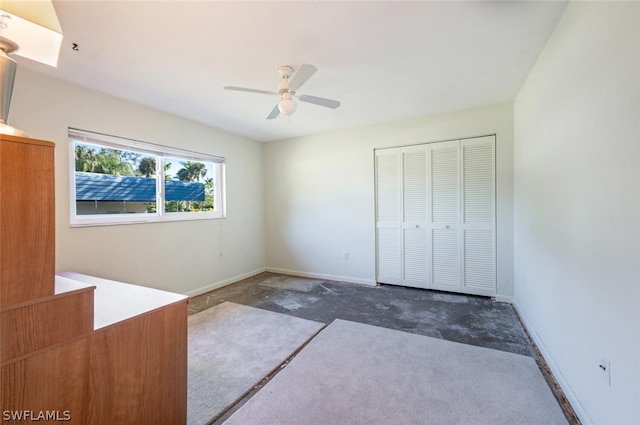 unfurnished bedroom with a closet and ceiling fan