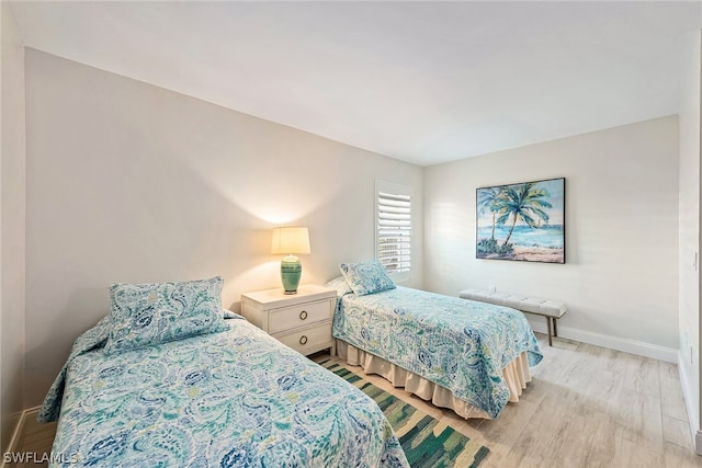 bedroom featuring light wood-type flooring