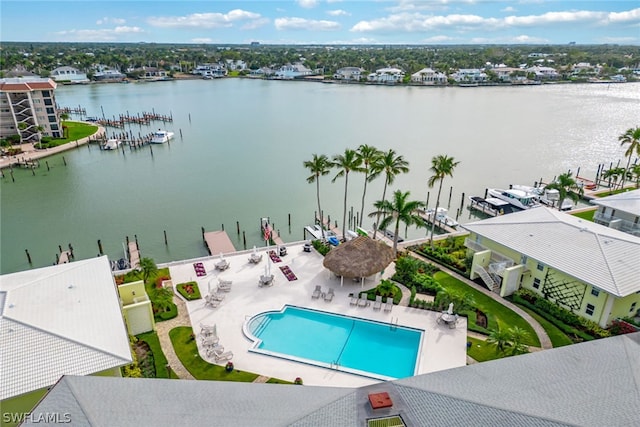 birds eye view of property with a water view