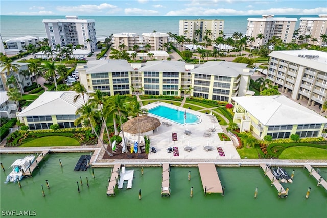 birds eye view of property featuring a water view