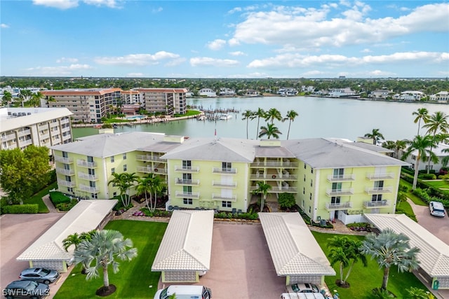 birds eye view of property with a water view