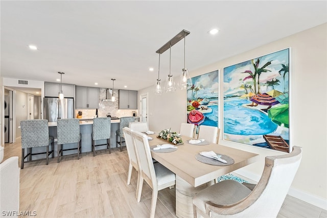 dining area featuring light hardwood / wood-style flooring