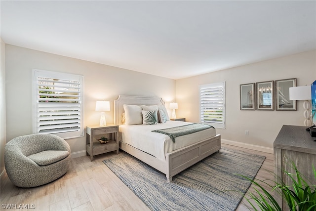 bedroom featuring light wood-type flooring