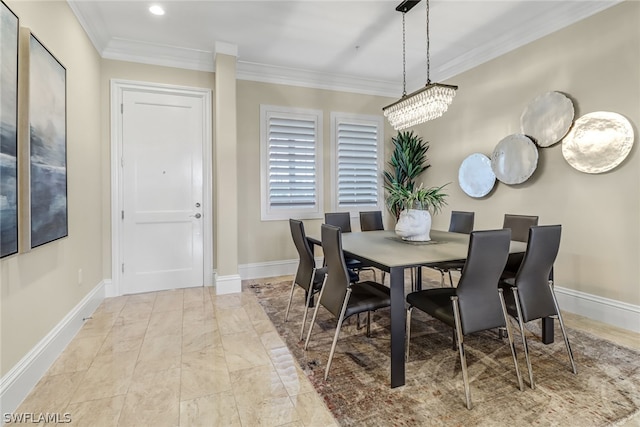 dining space with recessed lighting, crown molding, and baseboards