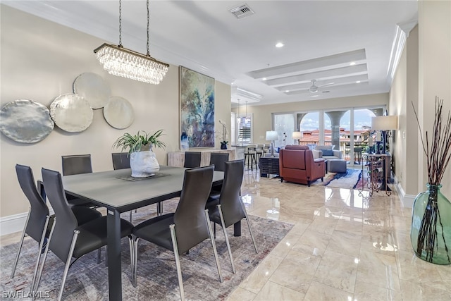 dining space with ornamental molding and ceiling fan with notable chandelier