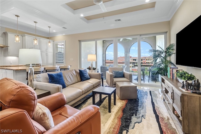 living room featuring ornamental molding