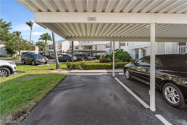 view of partially covered parking lot