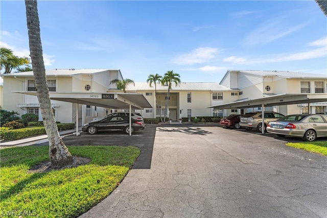 view of partially covered parking lot