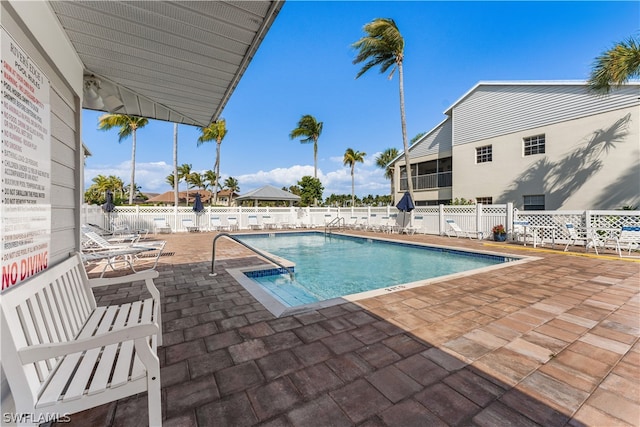 view of pool featuring a patio area