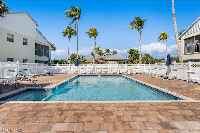 view of swimming pool featuring a patio