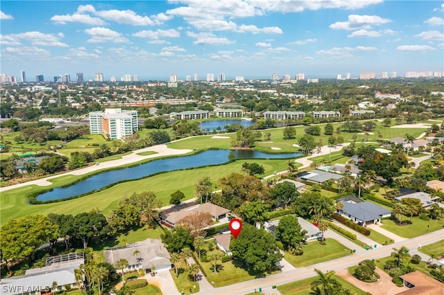 bird's eye view with golf course view, a water view, and a city view