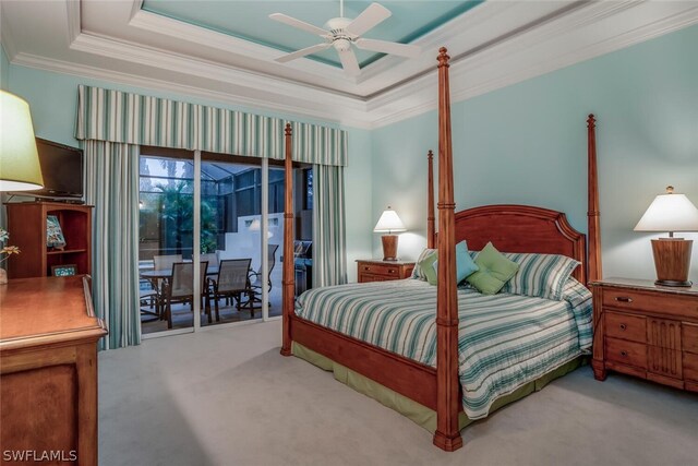 carpeted bedroom featuring ornamental molding, ceiling fan, access to outside, and a raised ceiling