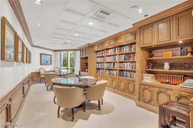 dining area with light carpet and crown molding